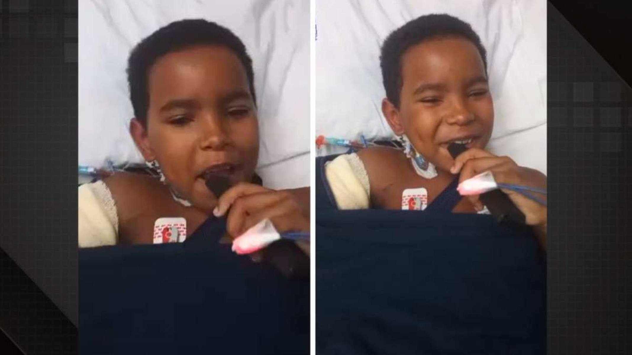 Menino de 8 anos grava vídeo cantando depois de cirurgia para reimplantar braço arrancado em acidente de trânsito - (crédito: Reprodução/Redes sociais) Menino de 8 anos grava vídeo cantando depois de cirurgia para reimplantar braço arrancado em acidente de trânsito - (crédito: Reprodução/Redes sociais)