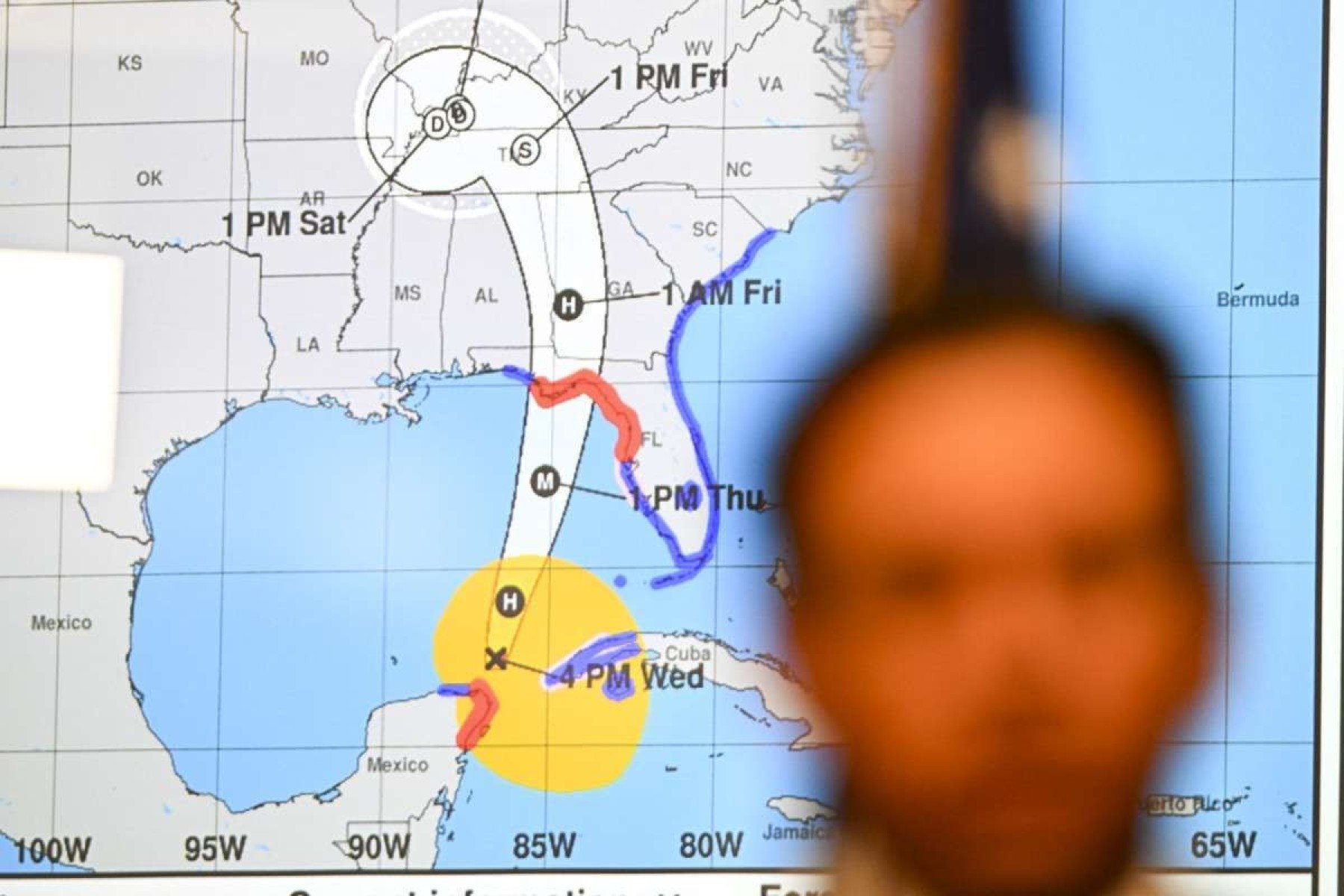  Florida Governor Ron DeSantis speaks during a press conference at the State Emergency Operations Center in Tallahassee, Florida, on September 26, 2024 as Hurricane Helene was set to slam into the Florida coast as a "catastrophic" Category 4 storm. An increasingly powerful hurricane threatening "catastrophic," dangerous storm surges and flooding was forecast to hit Florida's Gulf coast on September 26, as thousands of residents evacuated towns along the US state's shoreline. Helene strengthened into a hurricane mid-morning September 25 in the Gulf of Mexico and is "expected to bring life-threatening storm surge, damaging winds, and flooding rains to a large portion of Florida and the Southeastern United States," the National Hurricane Center in Miami said in its latest bulletin. (Photo by CHANDAN KHANNA / AFP)       