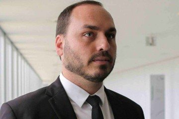 Carlos Bolsonaro: 'Colocar as Forças Armadas perto foi um dos maiores erros do governo Bolsonaro. Mas não tinha quem ele conhecia que não fosse das Forças Armadas' - (crédito: AFP) Carlos Bolsonaro: 'Colocar as Forças Armadas perto foi um dos maiores erros do governo Bolsonaro. Mas não tinha quem ele conhecia que não fosse das Forças Armadas' - (crédito: AFP)