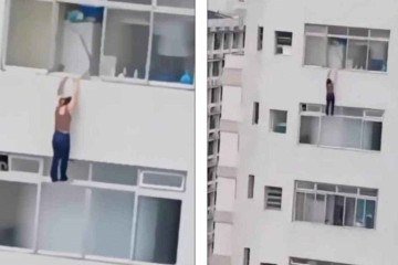 Vídeo: mulher fica pendurada em prédio ao limpar janela de apartamento - Reprodução