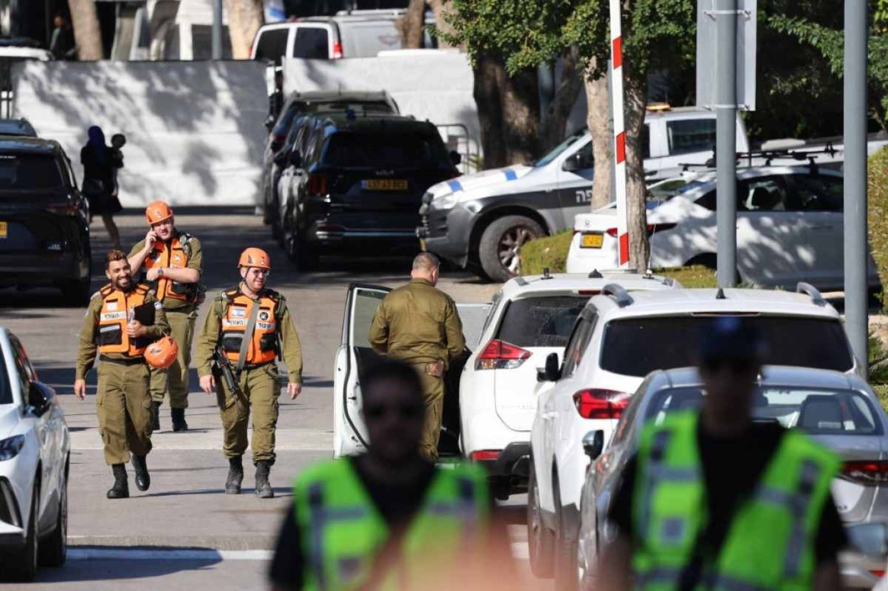  Members of the Israeli security forces walk along a street leading to Prime Minister Benjamin Netanyahus residence in Caesarea on October 19, 2024. Netanyahus office said a drone was launched toward his residence on October 19, after the military reported a drone from Lebanon had 