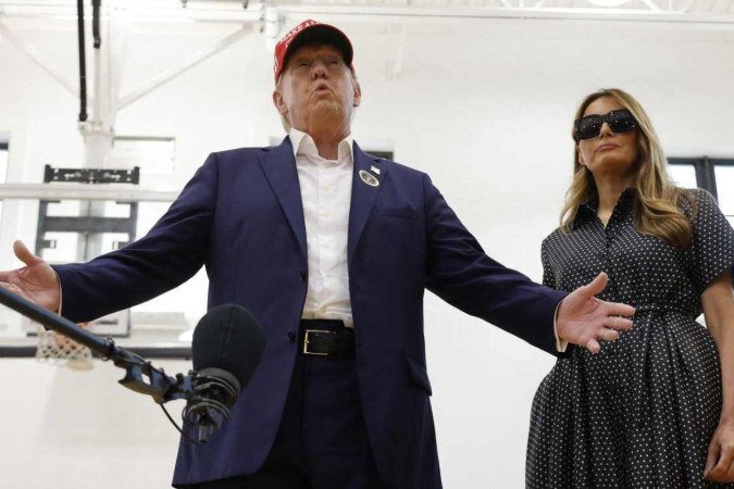 O casal Trump tornou-se alvo de um protesto em massa dos brasileiros - (crédito: Getty Images via AFP) O casal Trump tornou-se alvo de um protesto em massa dos brasileiros - (crédito: Getty Images via AFP)
