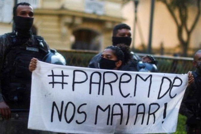 Protesto após a ação policial matar 14 pessoas no Guarujá em 2014 -  (crédito: Getty Images)