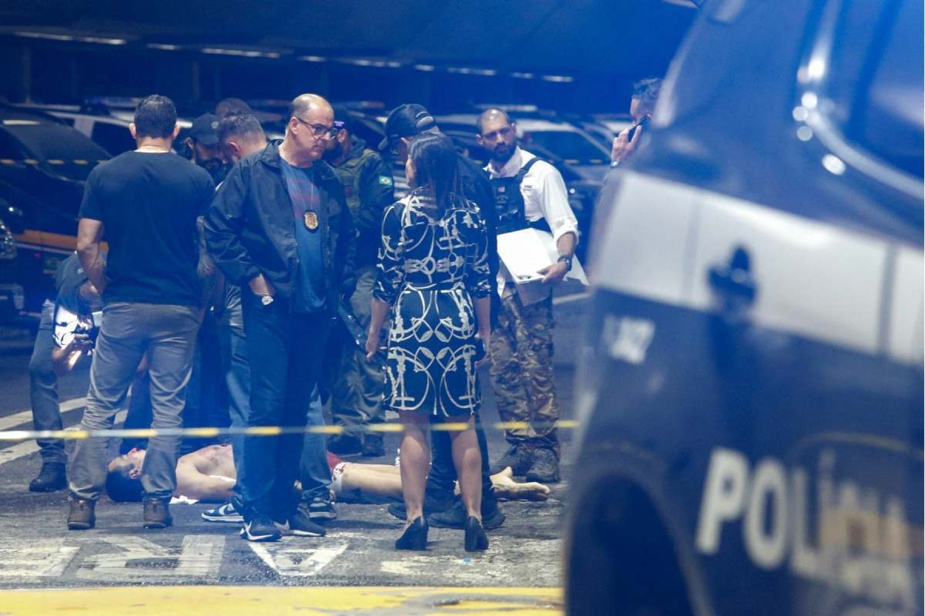  EDITORS NOTE: Graphic content / Police officers and forensic workers attend the scene of a shooting at Guarulhos international airport in Guarulhos, Sao Paulo on November 8, 2024. Brazilian real estate agent Antonio Vinicius Lopes Gritzbach, linked to organized crime, was shot dead Friday afternoon at Guarulhos international airport, which serves the city of Sao Paulo according to the Sao Paulo Public Security Secretariat. (Photo by Miguel SCHINCARIOL / AFP)
      