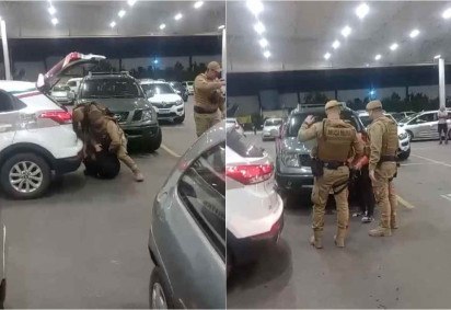 Testemunhas capturaram imagens que mostram Aline caída no chão e, posteriormente, sendo colocada no porta-malas de uma viatura pelos policiais -  (crédito: Reprodução/Arquivo Pessoal)