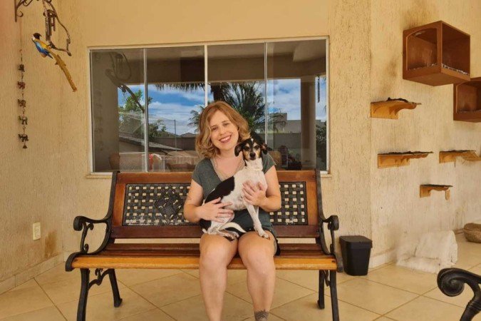 Helena e a cachorrinha Duda - (crédito: Arquivo pessoal) Helena e a cachorrinha Duda - (crédito: Arquivo pessoal)