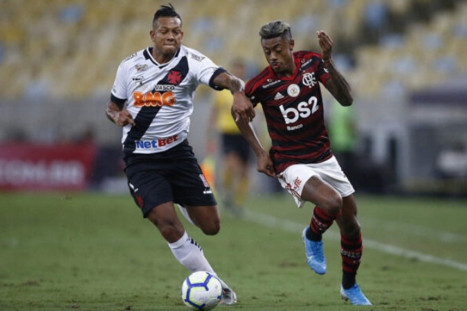  RIO DE JANEIRO, BRAZIL - NOVEMBER 13: Bruno Henrique of Flamengo and Fredy Guarin of Vasco during a match between Flamengo and Vasco as part of Brasileirao Seria A 2019 at Maracana Stadium on November 13, 2019 in Rio de Janeiro, Brazil. (Photo by Wagner Meier/Getty Images) *** Local Caption *** Bruno Henrique ; Fredy Guarin
     -  (crédito:  Getty Images)