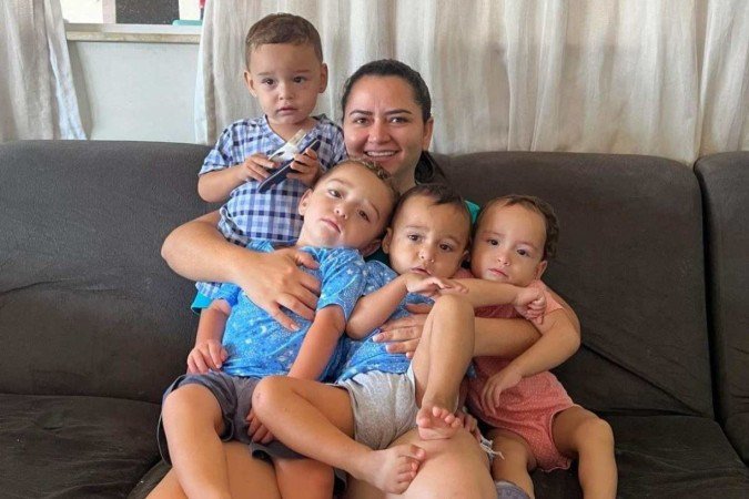 Os quadrigêmeos e o pai 