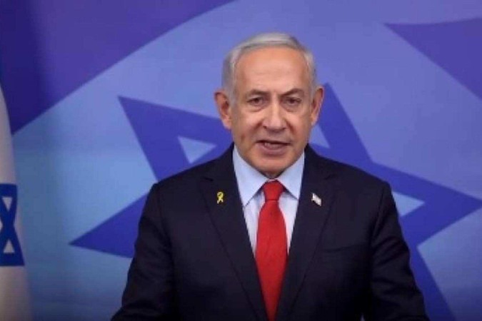 O primeiro-ministro Benjamin Netanyahu fala na TV: ameaça de uso da força em caso de violação da trégua 
