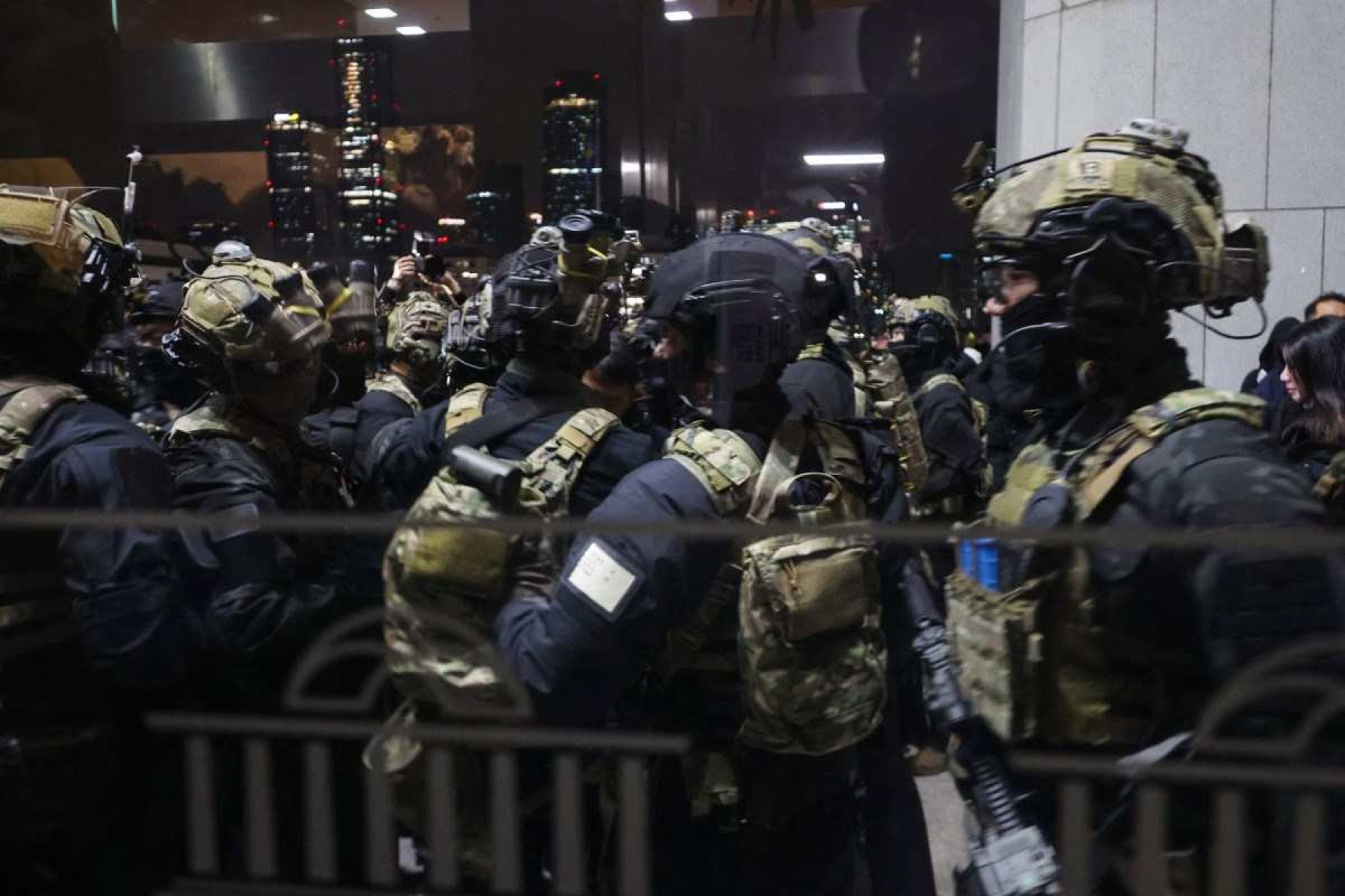  Soldiers try to enter the National Assembly in Seoul on December 4, 2024, after South Korea President Yoon Suk Yeol declared emergency martial law. South Koreas President Yoon Suk Yeol on December 3 declared emergency martial law, accusing the opposition of being 