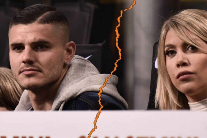  Inter Milan's Argentine forward Mauro Icardi (L) and his wife Argentine television personality, and football agent, Wanda Nara attend the Italian Serie A football match Inter Milan vs Lazio Rome on March 31, 2019 at the San Siro stadium in Milan. (Photo by Marco BERTORELLO / AFP)        (Photo credit should read MARCO BERTORELLO/AFP via Getty Images)
     -  (crédito:  AFP via Getty Images)