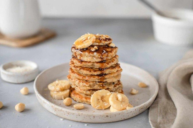 Panqueca de banana com coco ralado (Imagem: Teresa Kasprzycka | Shutterstock) - (crédito: EdiCase) Panqueca de banana com coco ralado (Imagem: Teresa Kasprzycka | Shutterstock) - (crédito: EdiCase)