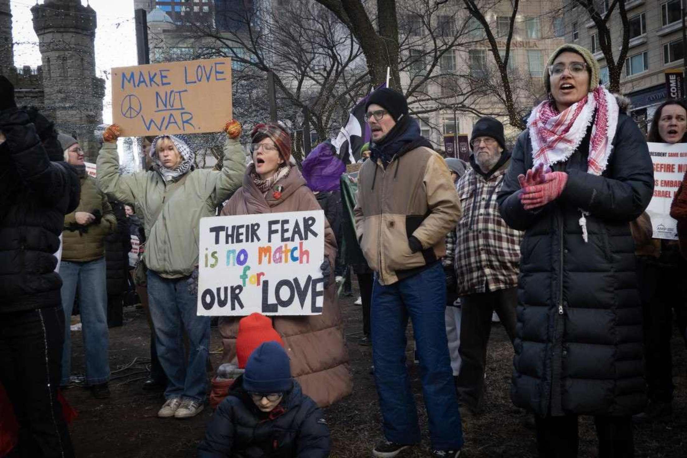  CHICAGO, ILLINOIS - JANUARY 25: Activists protest the agenda of President Trump during a rally near the water tower on the Magnificent Mile on January 25, 2025 in Chicago, Illinois. A coalition of activist groups, including those supporting Palestine, immigrant rights, LGBTQ rights and womens rights held a rally along the Magnificent Mile before marching down Michigan Avenue to their destination near Trump Tower.   Scott Olson/Getty Images/AFP (Photo by SCOTT OLSON / GETTY IMAGES NORTH AMERICA / Getty Images via AFP)       