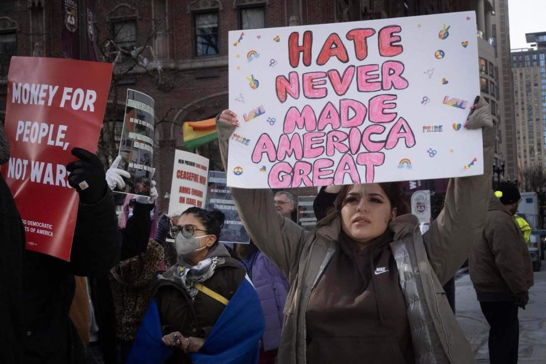  CHICAGO, ILLINOIS - JANUARY 25: Activists protest the agenda of President Trump during a rally near the water tower on the Magnificent Mile on January 25, 2025 in Chicago, Illinois. A coalition of activist groups, including those supporting Palestine, immigrant rights, LGBTQ rights and womens rights held a rally along the Magnificent Mile before marching down Michigan Avenue to their destination near Trump Tower.   Scott Olson/Getty Images/AFP (Photo by SCOTT OLSON / GETTY IMAGES NORTH AMERICA / Getty Images via AFP)       