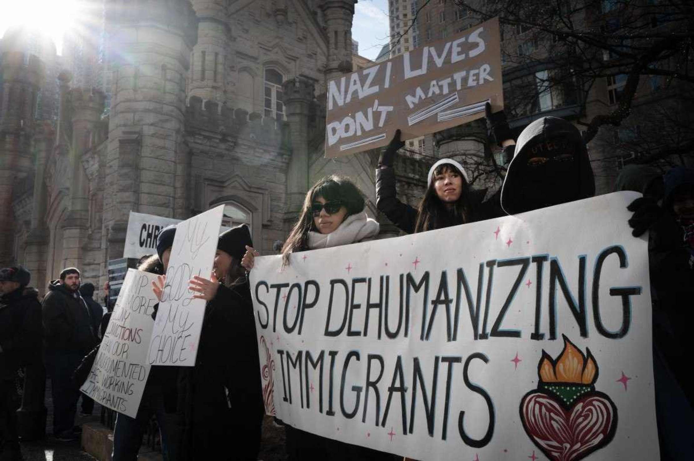  CHICAGO, ILLINOIS - JANUARY 25: Activists protest the agenda of President Trump during a rally near the water tower on the Magnificent Mile on January 25, 2025 in Chicago, Illinois. A coalition of activist groups, including those supporting Palestine, immigrant rights, LGBTQ rights and womens rights held a rally along the Magnificent Mile before marching down Michigan Avenue to their destination near Trump Tower.   Scott Olson/Getty Images/AFP (Photo by SCOTT OLSON / GETTY IMAGES NORTH AMERICA / Getty Images via AFP)       