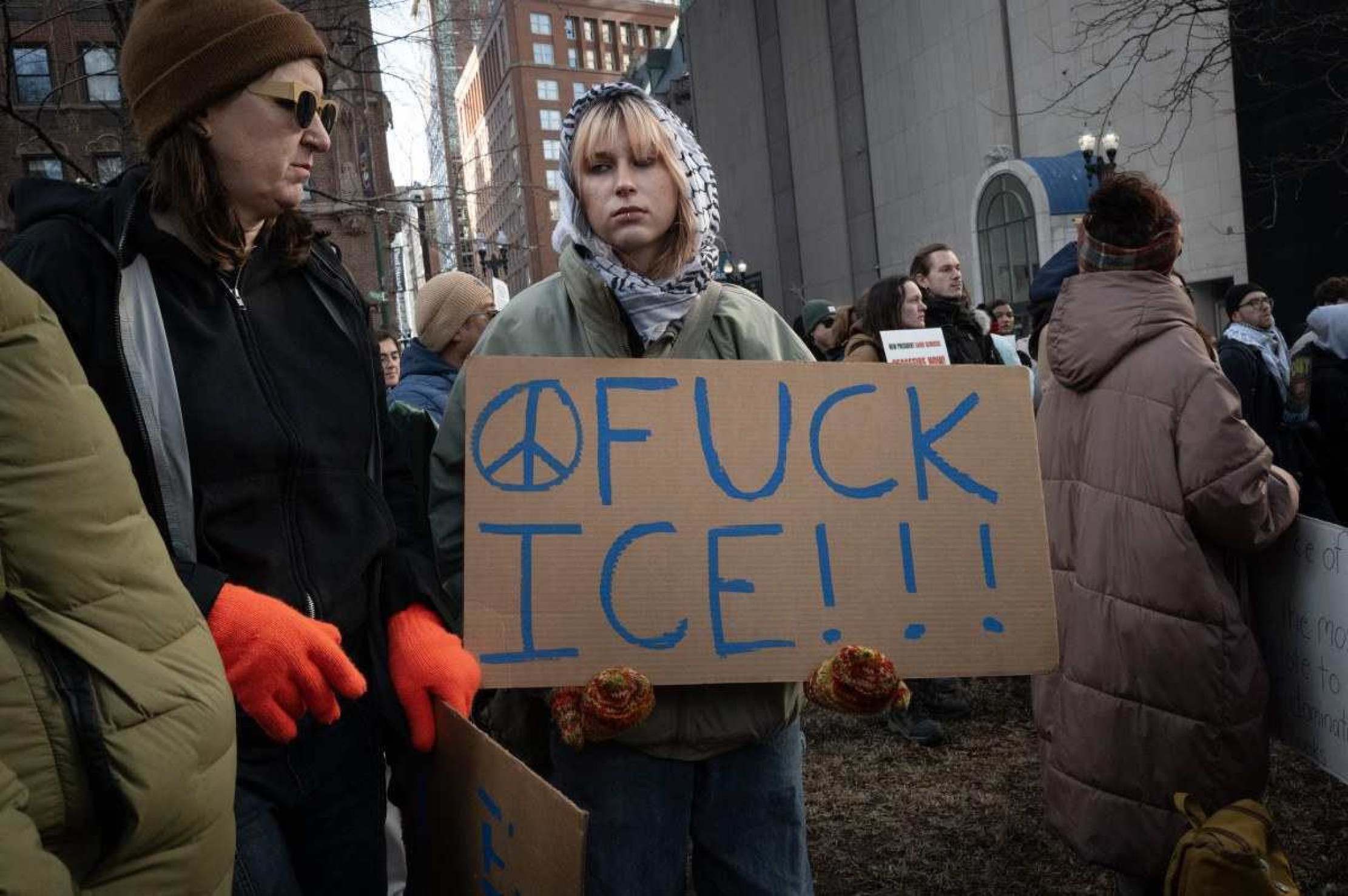  CHICAGO, ILLINOIS - JANUARY 25: (Editors note: Image contains profanity) Activists protest the agenda of President Trump during a rally near the water tower on the Magnificent Mile on January 25, 2025 in Chicago, Illinois. A coalition of activist groups, including those supporting Palestine, immigrant rights, LGBTQ rights and womens rights held a rally along the Magnificent Mile before marching down Michigan Avenue to their destination near Trump Tower.   Scott Olson/Getty Images/AFP (Photo by SCOTT OLSON / GETTY IMAGES NORTH AMERICA / Getty Images via AFP)       