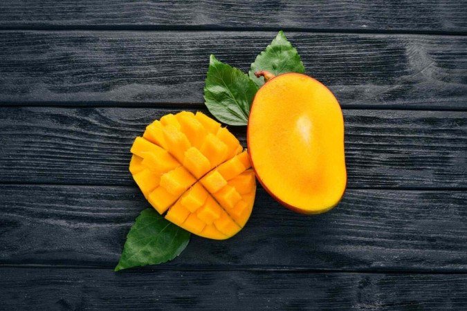 A manga é uma fruta repleta de nutrientes essenciais para a saúde (Imagem: YARUNIV Studio | Shutterstock) - (crédito: EdiCase) A manga é uma fruta repleta de nutrientes essenciais para a saúde (Imagem: YARUNIV Studio | Shutterstock) - (crédito: EdiCase)