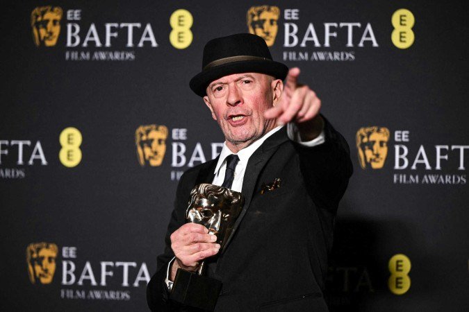  French movie director Jacques Audiard poses with the award for Best film not in English language for 