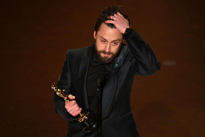  Kieran Culkin recebe o prêmio de melhor ator coadjuvante -  (crédito: Patrick T. Fallon / AFP)