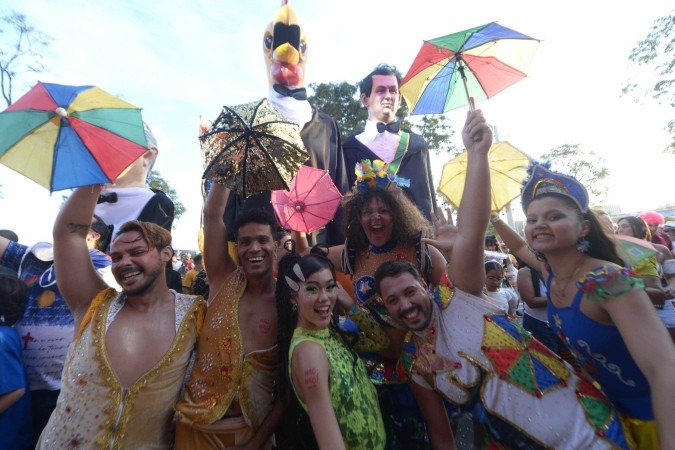 O bloco levou uma explosão de cores, música e alegria para a Esplanada dos Ministérios - (crédito: Ed Alves/CB/D.A Press) O bloco levou uma explosão de cores, música e alegria para a Esplanada dos Ministérios - (crédito: Ed Alves/CB/D.A Press)
