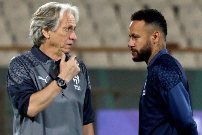 Neymar e Jorge Jesus se desentenderam durante agem do brasileiro pelo Al-Hilal - (crédito: Foto: ATTA KENARE/AFP via Getty Images) Neymar e Jorge Jesus se desentenderam durante agem do brasileiro pelo Al-Hilal - (crédito: Foto: ATTA KENARE/AFP via Getty Images)