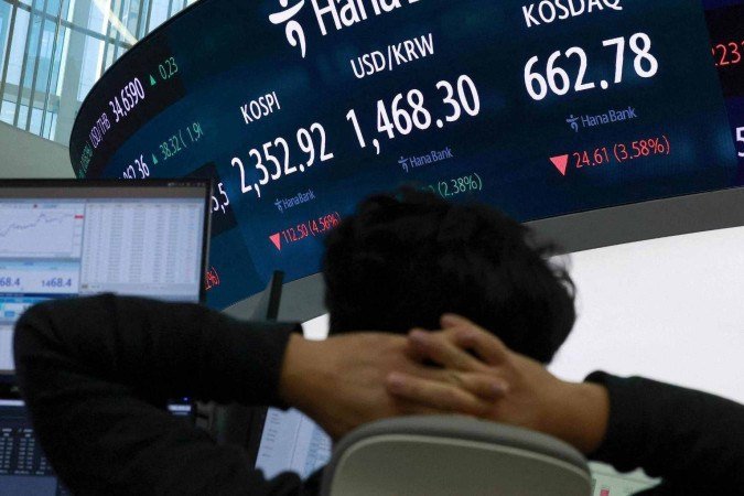 Tarifas anunciadas por Trump causaram quedas bruscas no mercado de ações - (crédito: EPA) Tarifas anunciadas por Trump causaram quedas bruscas no mercado de ações - (crédito: EPA)
