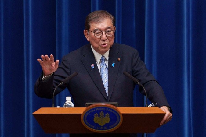 O primeiro-ministro do Japão, Shigeru Ishiba, disse que está analisando as barreiras não tarifárias apontadas pelos Estados Unidos - (crédito: Nicolas Datiche/POOL/AFP) O primeiro-ministro do Japão, Shigeru Ishiba, disse que está analisando as barreiras não tarifárias apontadas pelos Estados Unidos - (crédito: Nicolas Datiche/POOL/AFP)