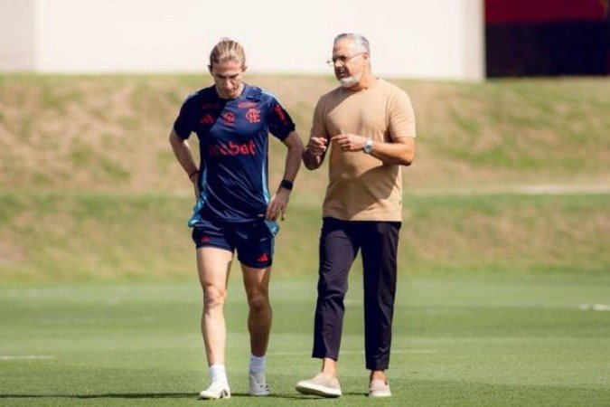 Filipe Luís e José Boto em conversa em treino do Flamengo - (crédito: Foto: Adriano Fontes/Flamengo) Filipe Luís e José Boto em conversa em treino do Flamengo - (crédito: Foto: Adriano Fontes/Flamengo)