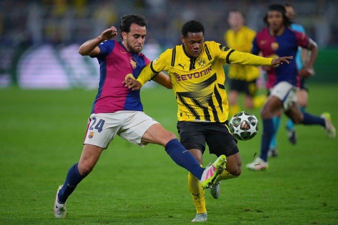 O Borussia Dortmund venceu o Barcelona por 3 x 1, mas não foi capaz de diminuir a diferença do placar agregado (5 x 3). Assim, acabou eliminado. - (crédito: Pau BARRENA / AFP) O Borussia Dortmund venceu o Barcelona por 3 x 1, mas não foi capaz de diminuir a diferença do placar agregado (5 x 3). Assim, acabou eliminado. - (crédito: Pau BARRENA / AFP)