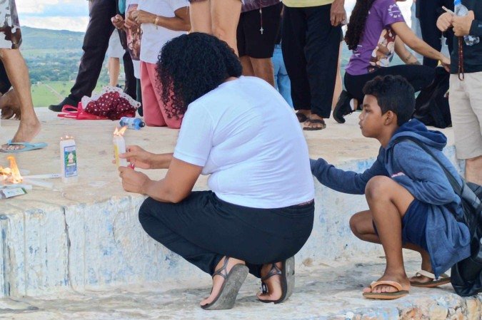 Maria e o filho Lucas Costa cumpriram penitências na celebração