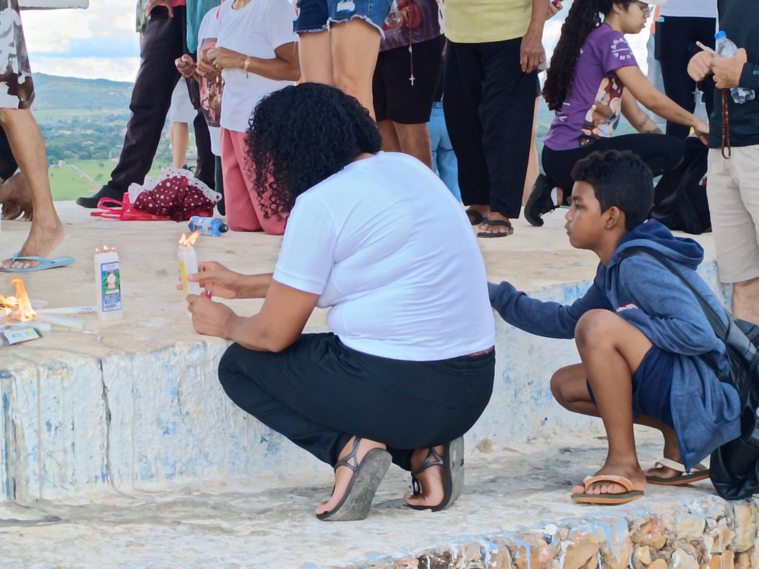 Maria e o filho Lucas Costa cumpriram penitências na celebração