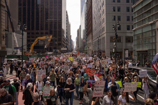 Passeata organizada para "Proteger Migrantes e o Planeta", em Manhattan, Nova York
