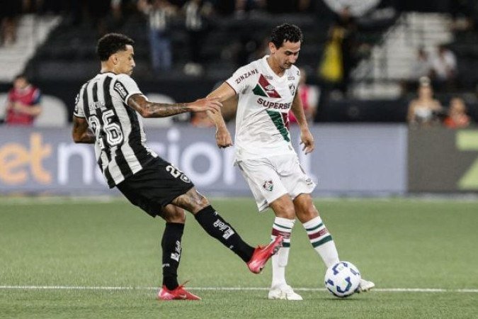 GANSO - A marcação do Botafogo estava muito compacta, e isso anulou a maior parte das jogadas que Ganso tentou durante o jogo. Sem conseguir ter sucesso, saiu para a entrada de Lima. NOTA 5,0. Foto: Marcelo Gonçalves/Fluminense 