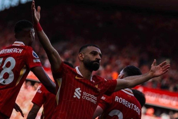 Salah comemora vitória sobre o Tottenham, que confirmou o título da Premier League 2024/25 - (crédito: Foto: Divulgação) Salah comemora vitória sobre o Tottenham, que confirmou o título da Premier League 2024/25 - (crédito: Foto: Divulgação)