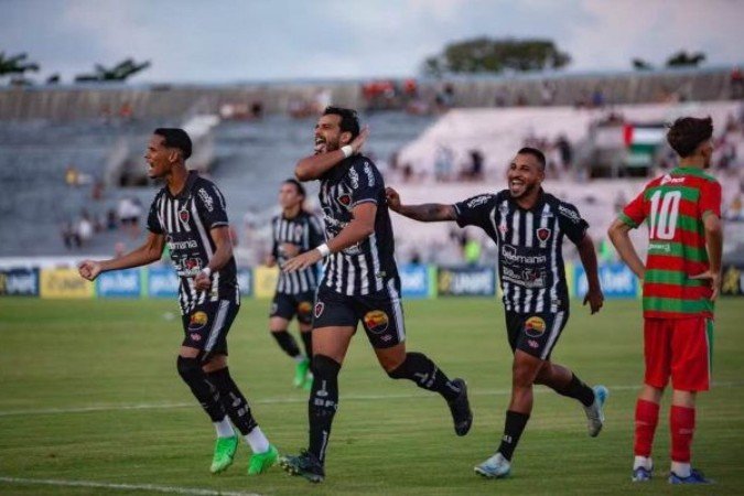 Henrique Dourado comemora gol pelo Botafogo-PB - (crédito: Foto: Cristiano Santos / Botafogo-PB) Henrique Dourado comemora gol pelo Botafogo-PB - (crédito: Foto: Cristiano Santos / Botafogo-PB)