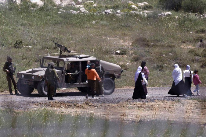 Exército israelense enviou nos últimos dias ordens de recrutamento a reservistas, para mobilizar milhares de militares com vistas a uma expansão de sua ofensiva contra o movimento islamista palestino Hamas em Gaza - (crédito: Jalaa MAREY / AFP) Exército israelense enviou nos últimos dias ordens de recrutamento a reservistas, para mobilizar milhares de militares com vistas a uma expansão de sua ofensiva contra o movimento islamista palestino Hamas em Gaza - (crédito: Jalaa MAREY / AFP)