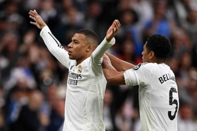Mbappé celebra após fazer um de seus dois gol na vitória sobre o Celta de Vigo, pelo Espanhol - (crédito: Foto: Denis Doyle/Getty Images) Mbappé celebra após fazer um de seus dois gol na vitória sobre o Celta de Vigo, pelo Espanhol - (crédito: Foto: Denis Doyle/Getty Images)