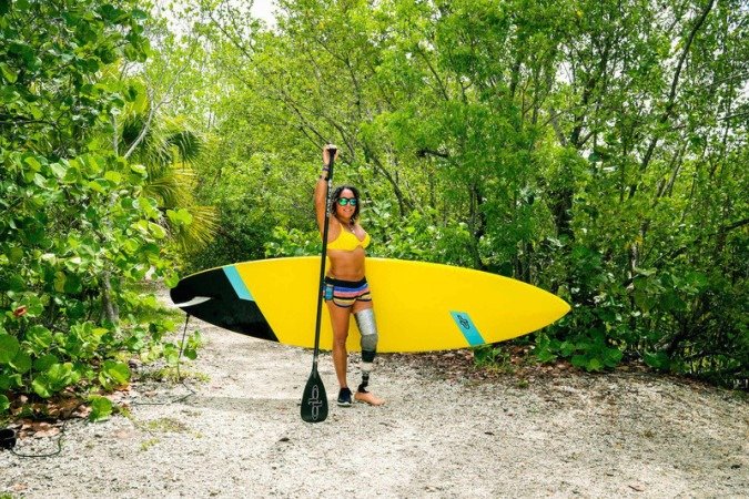 Frances Osorio Rivera says she is a kiteboarder by profession. She wakeboards. Paddleboards. Free-dives. Spearfishes. Does Scuba and skateboard. What she didn...t say was ...amputee.... An accident ended her military career, but she shares her appreciation for Florida...s access to water and wind by teaching kiteboarding to wounded warriors. The Florida outdoors is open to all abilities.
- (crédito: Uai Turismo) Frances Osorio Rivera says she is a kiteboarder by profession. She wakeboards. Paddleboards. Free-dives. Spearfishes. Does Scuba and skateboard. What she didn...t say was ...amputee.... An accident ended her military career, but she shares her appreciation for Florida...s access to water and wind by teaching kiteboarding to wounded warriors. The Florida outdoors is open to all abilities.
- (crédito: Uai Turismo)
