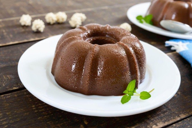 Pudim de chocolate (Imagem: Iaroshenko Maryna | Shutterstock) - (crédito: EdiCase) Pudim de chocolate (Imagem: Iaroshenko Maryna | Shutterstock) - (crédito: EdiCase)