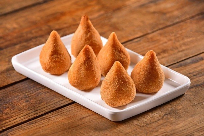 Coxinha de batata-doce (Imagem: MARCELOKRELLING | Shutterstock) - (crédito: EdiCase) Coxinha de batata-doce (Imagem: MARCELOKRELLING | Shutterstock) - (crédito: EdiCase)
