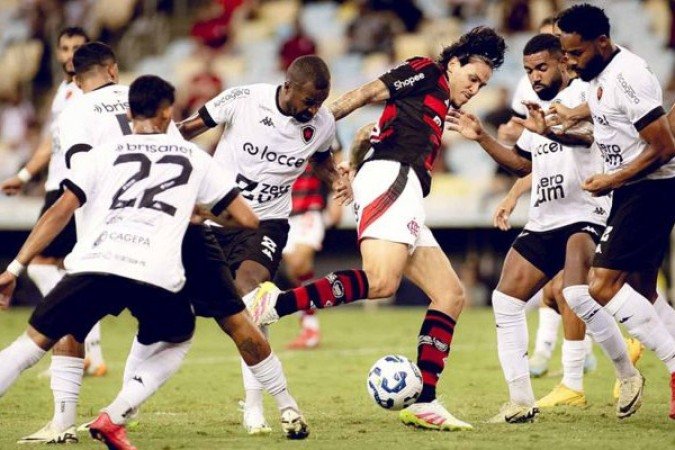 BOTAFOGO-PB - Foi uma surpresa o time, mesmo encarando um peso-pesado como o Flamengo, buscar o ataque e criar muitas chances. Mas a defesa é bem frágil e o Fla não teve dificuldade para chegar aos gols.  Henrique Dourado foi um atacante perigoso e o goleiro Michael mandou bem. Mas o melhor foi Rodrigo Alves. Saiu do banco, fez um gol e jogou muito. NOTA 6,0. Foto: Adriano Fontes/Flamengo