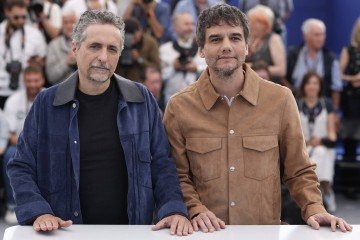 'Seguiremos encantando os públicos e os críticos ao redor do planeta', disse Lula sobre os dois prêmios recebidos em Cannes pelo filme O Agente Secreto. -  (crédito: Valery HACHE/AFP)