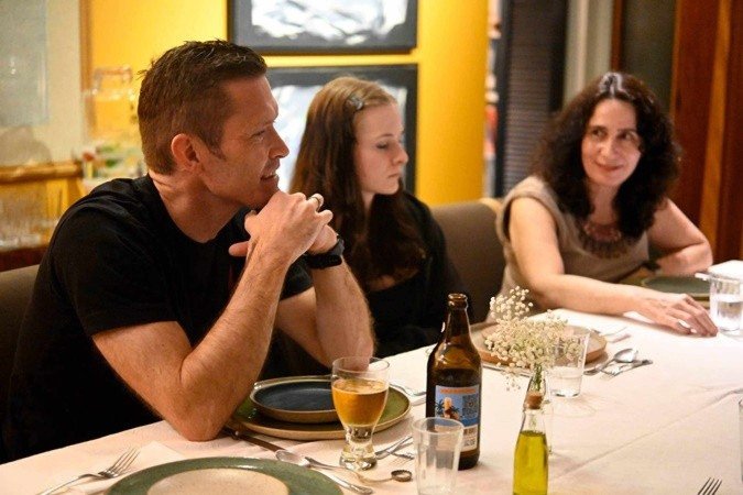 Clientes em almoço mensal no apê
