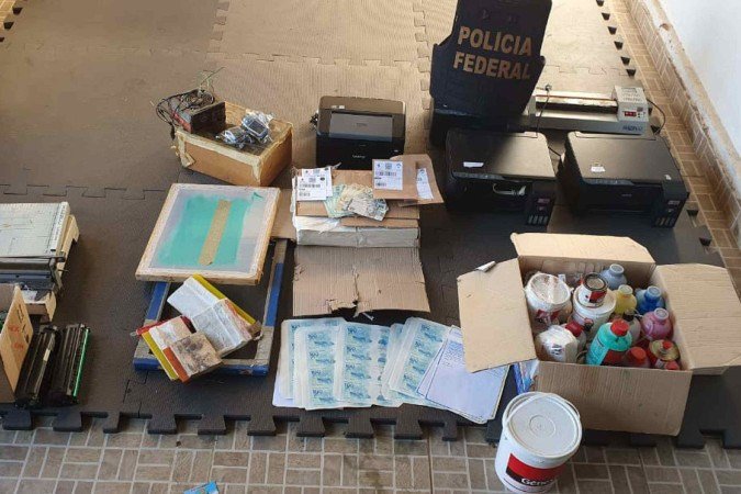Organização criminosa era especializada na fabricação e distribuição de cédulas falsas em várias regiões do país - (crédito: Divulgação/PF) Organização criminosa era especializada na fabricação e distribuição de cédulas falsas em várias regiões do país - (crédito: Divulgação/PF)