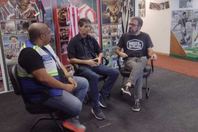 Marcos Santos, Mauro Galvão e Marco Antonio Rocha, durante entrevista ao Museu da Pelada, no Museu da Suderj - (crédito: Foto: Divulgação) Marcos Santos, Mauro Galvão e Marco Antonio Rocha, durante entrevista ao Museu da Pelada, no Museu da Suderj - (crédito: Foto: Divulgação)