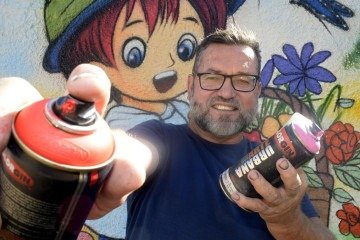 Com mais de 26 anos de trajetória no grafite, Fan transforma a cidade em sua galeria -  (crédito:  Marcelo Ferreira/CB/D.A Press)