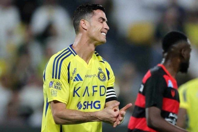 Cristiano Ronaldo em ação com a camisa do Al-Nassr, da Arábia Saudita - (crédito: Foto: Abdullah Ahmed/Getty Images) Cristiano Ronaldo em ação com a camisa do Al-Nassr, da Arábia Saudita - (crédito: Foto: Abdullah Ahmed/Getty Images)