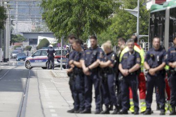  Police block a street near a school where several people died in a shooting, on June 10, 2025 in Graz, southeastern Austria. Ten people died after a suspected shooter opened fire in a southeastern Austrian school, press agency APA quoted Graz city mayor Elke Kahr as saying. Several students and at least one adult are among those killed, Kahr confirmed to APA. (Photo by Alex HALADA / AFP)
      