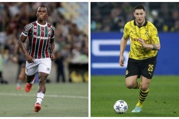 O baixinho Jhon Arias ensaia dar trabalho ao zagueiro grandalhão Niklas Sule -  (crédito: Lucas Merçon/Fluminense e BVB/Divulgação)