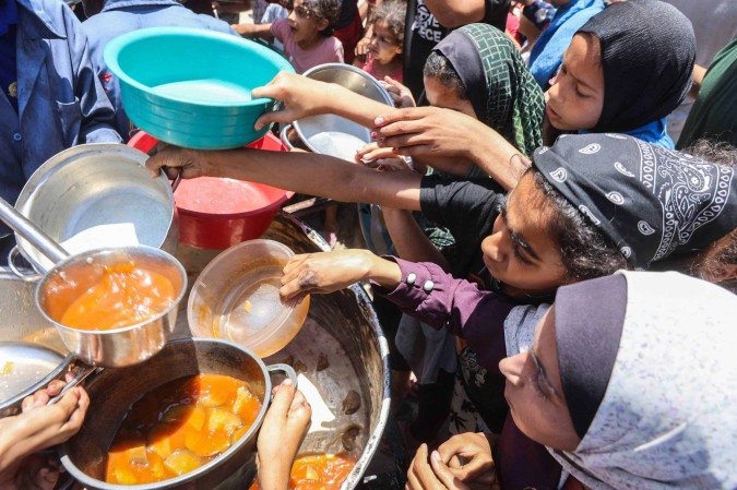 Imposição da fome sistemática aos palestinos na Faixa de Gaza parece normalizada  -  (crédito:  AFP)